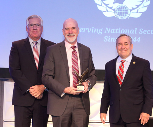 Mike Cashner accepts President's Award for outstanding leadership and dedicated support of the NDTA's mission.